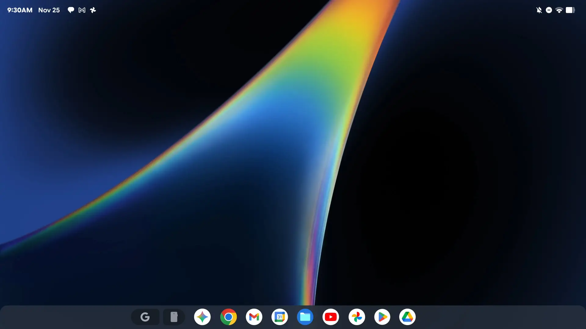Bureau du système d'exploitation Googlebook avec sa barre des tâches et les applications Google, notamment Chrome, Gmail et Play Store