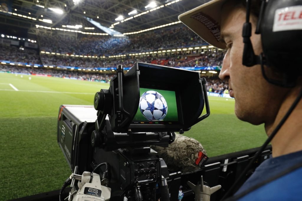 Caméraman de match de football